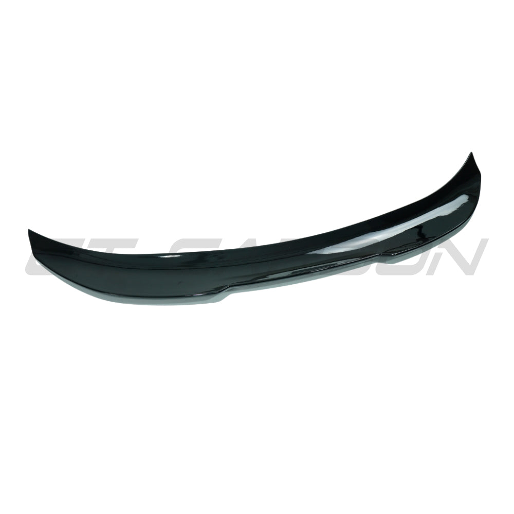 BMW 1 Series E82 2007-2013 CT Carbon gloss black V3 spoiler mounted on the rear of the car
