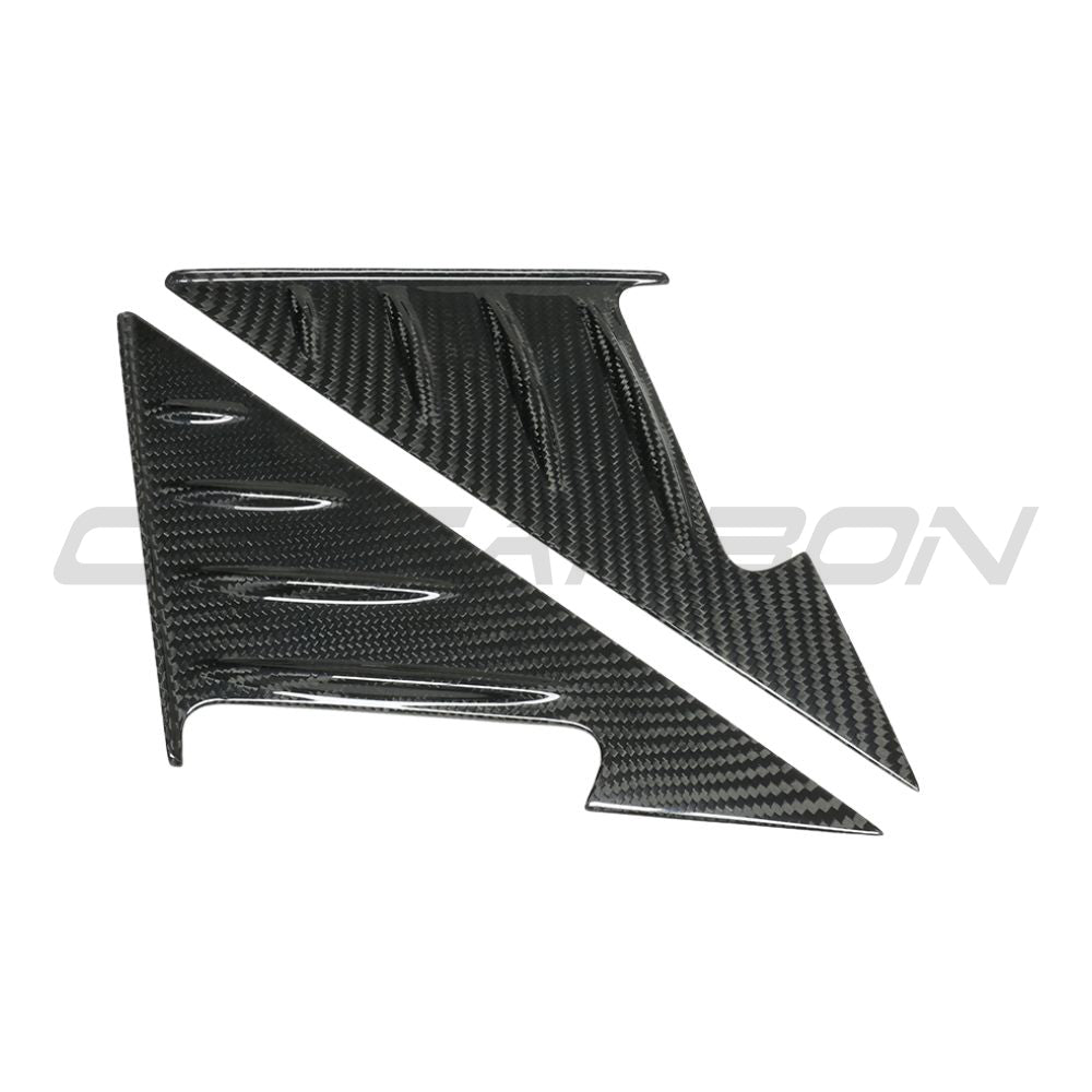 BMW G82 M3 2020+ dry carbon fibre mirror pillar trim by CT Carbon, showcasing sleek, lightweight accessory for vehicle enhancement.