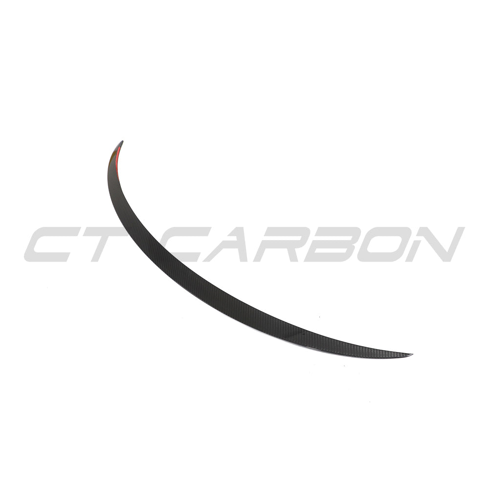 Tesla Model 3 Facelift 2023+ carbon fiber spoiler by CT Carbon, showing the sleek aerodynamic design on the car's rear.
