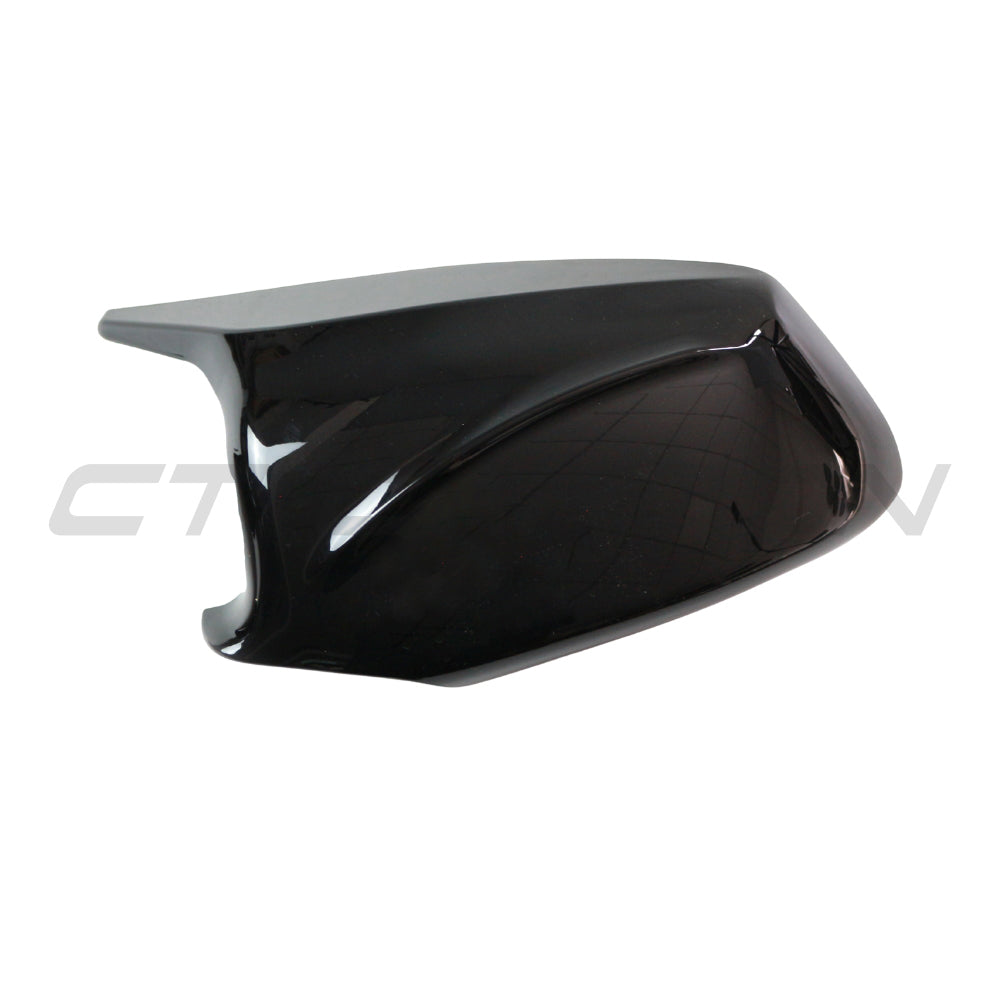 BMW 5 Series F10/F11 2011-2013 gloss black side mirrors by CT Carbon showing sleek exterior design