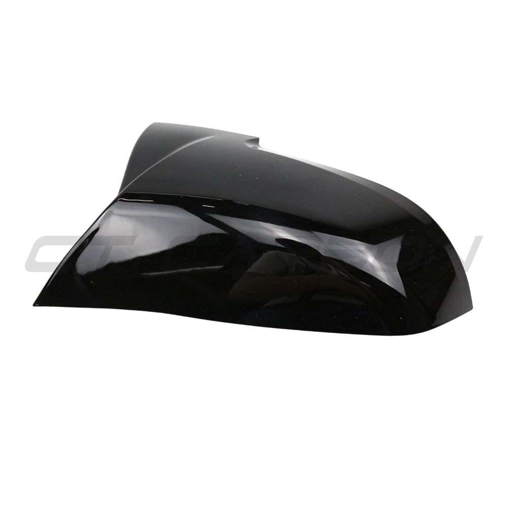 BMW 5 Series F10/F11 2013-2017 CT Carbon gloss black side mirrors, close-up view showing sleek, aerodynamic design.