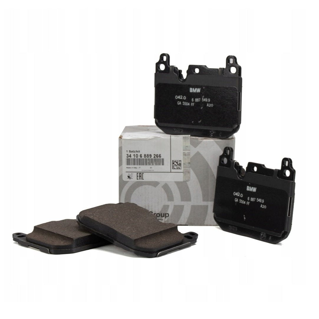 Genuine BMW F40 M135i, F44, F48 F39 MINI JCW front brake pads, model 34106889266, showing new brake pads on a clean surface.