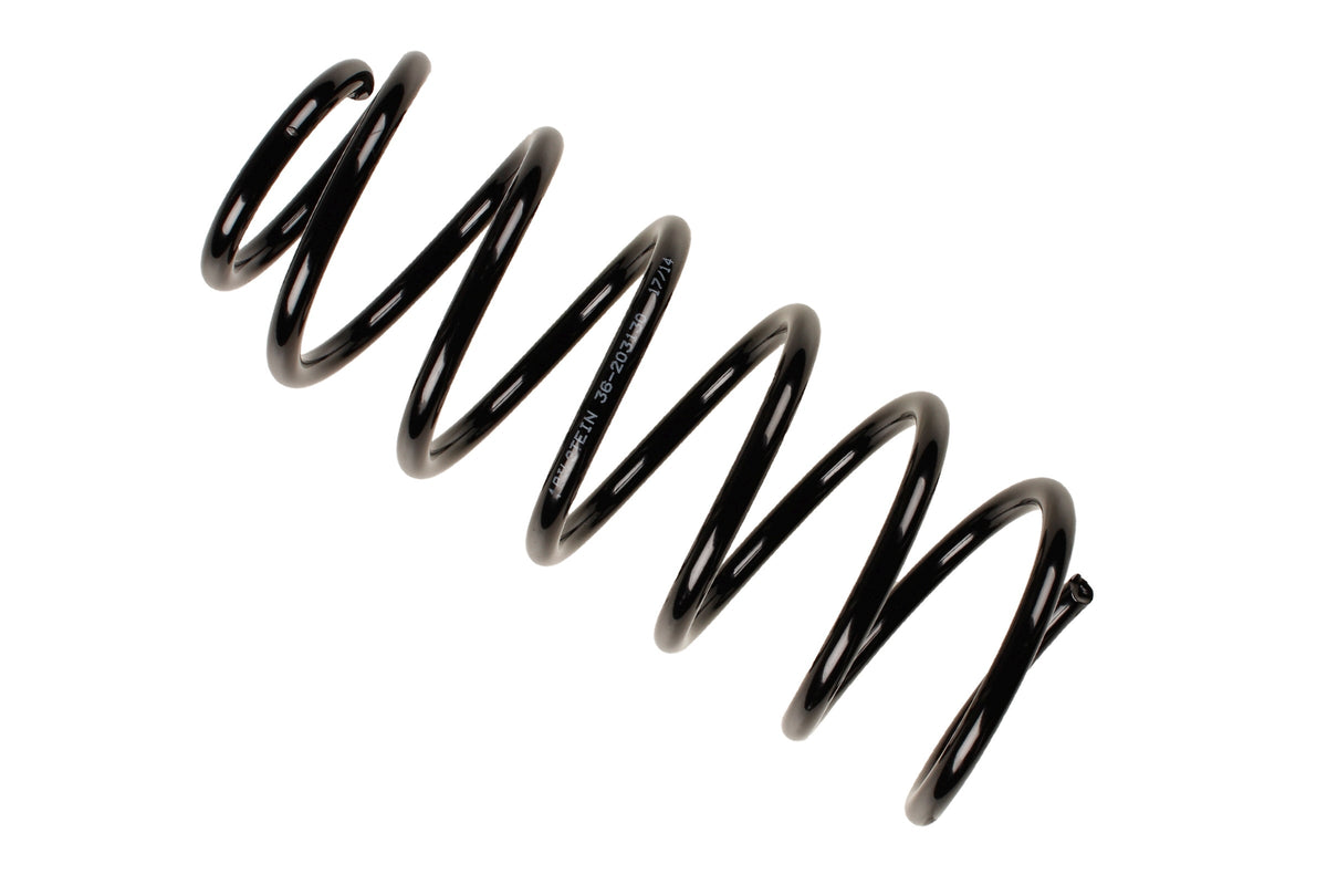 Bilstein B3 OE replacement coil spring for Volkswagen Caddy and Polo, part number 36-203130, showing the spring's metal coils.