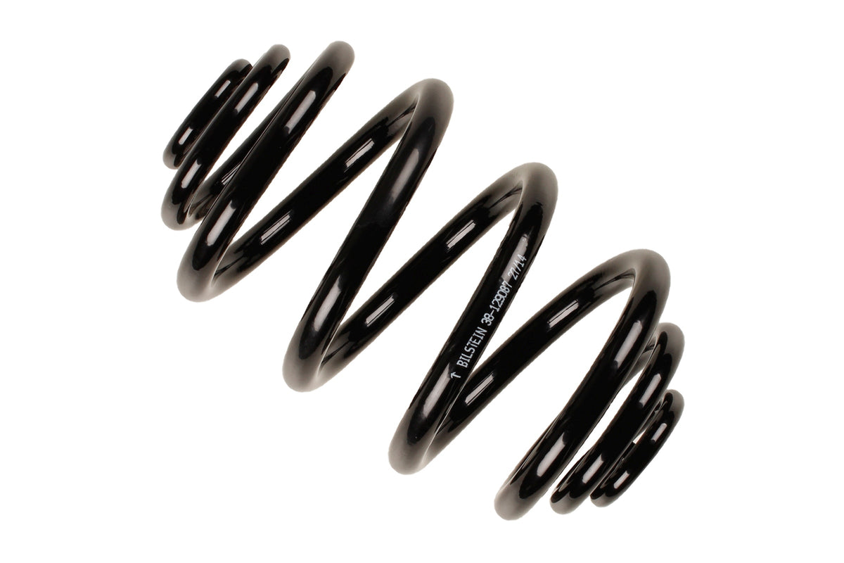 Bilstein B3 OE replacement coil spring for BMW 3 Series E36, part number 38-129087, showing the spring's coiled metal design.
