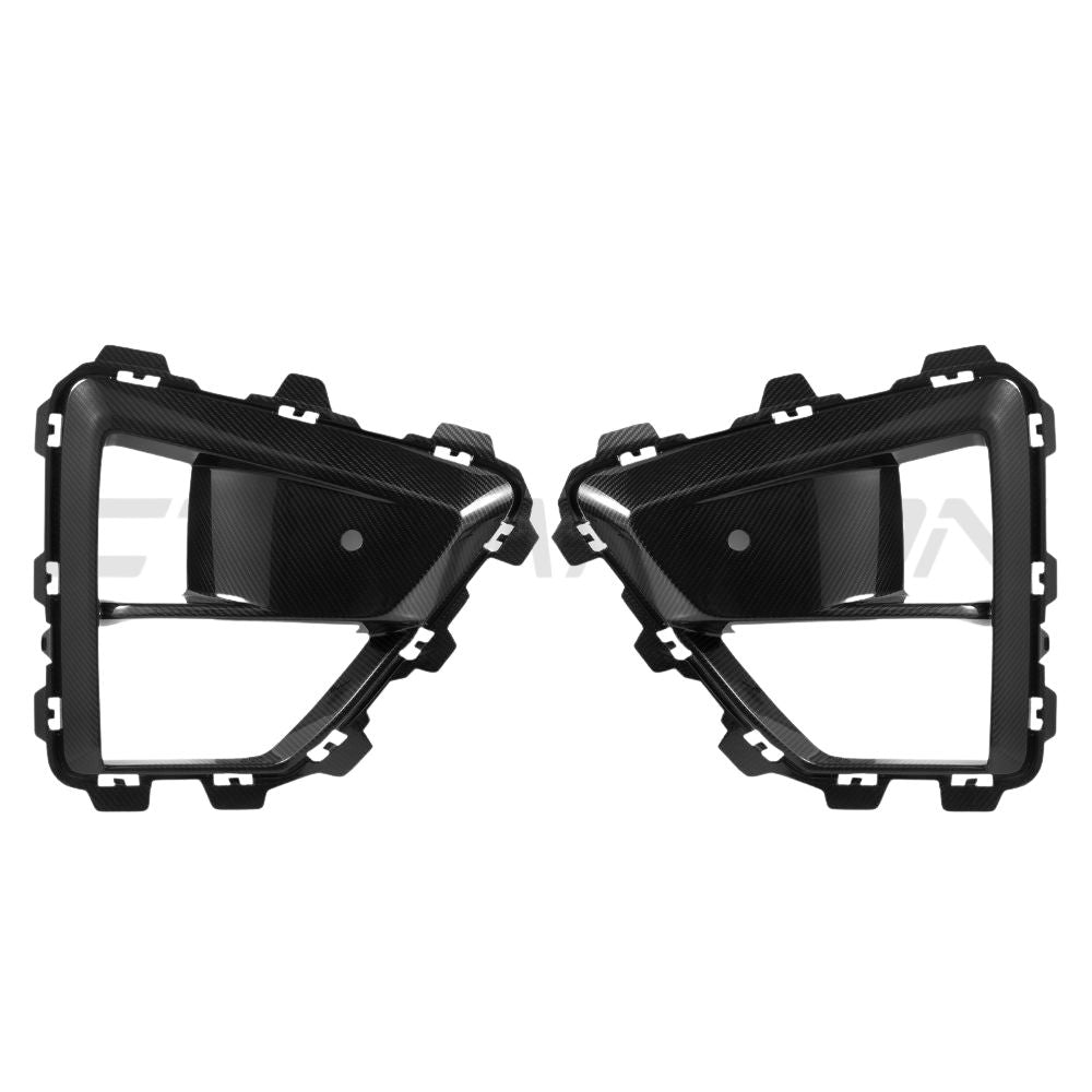 BMW X5M LCI 2023 carbon fibre front bumper trim accessory by CT Carbon, showing close-up of sleek, lightweight car enhancement.