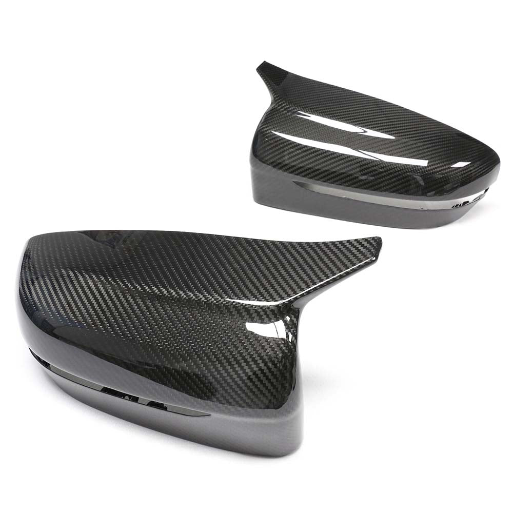 BMW G42 2 Series 2022+ dry carbon mirror cover replacements by CT Carbon, showing sleek, textured carbon fiber mirror covers.