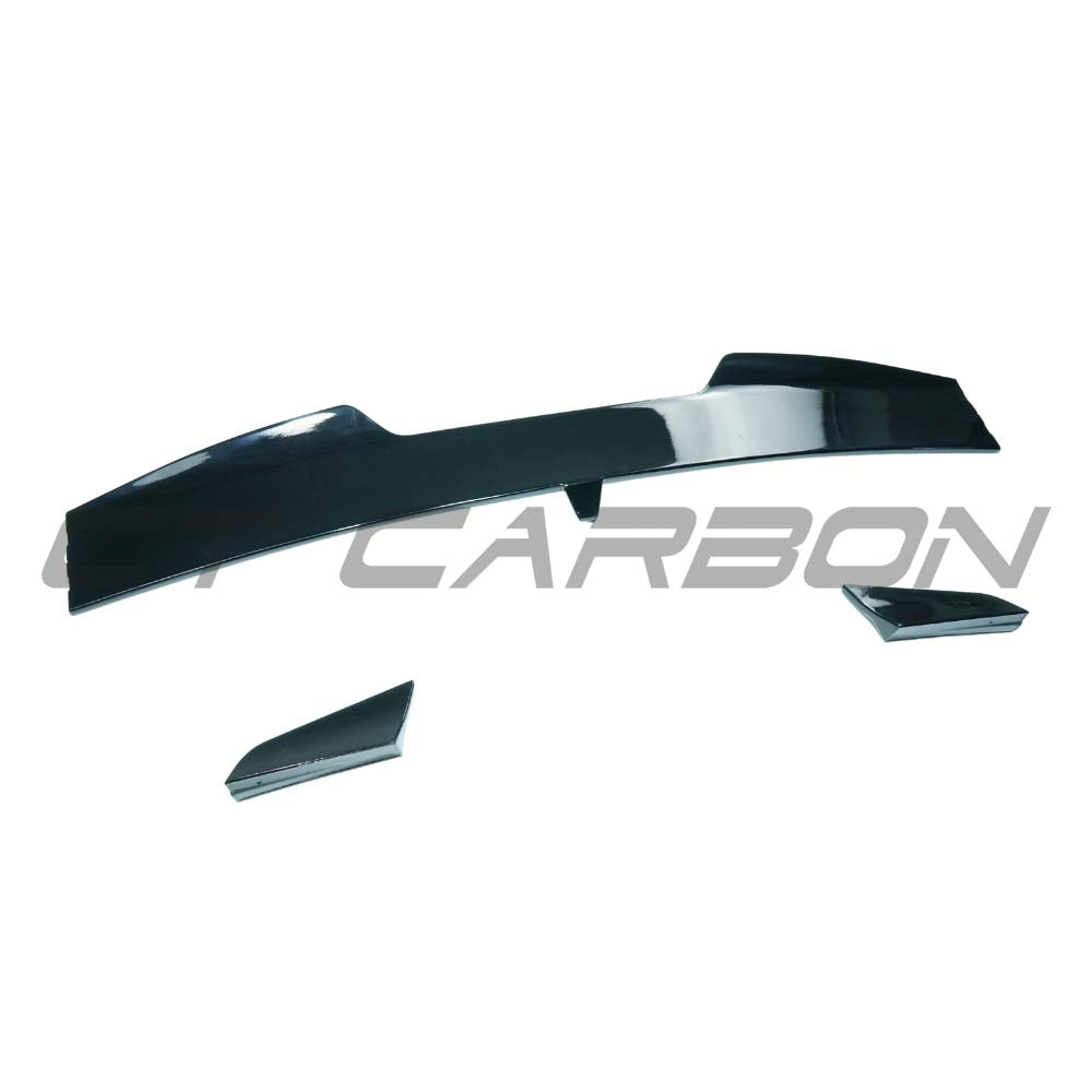 BMW X6 G06 2019+ CT Carbon gloss black roof spoiler, side view showing sleek aerodynamic design on the vehicle roof.