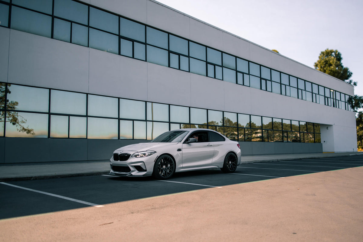 HRE PERFORMANCE WHEELS FF01 alloy wheel with a multi-spoke design, shown in a sleek finish on a car.