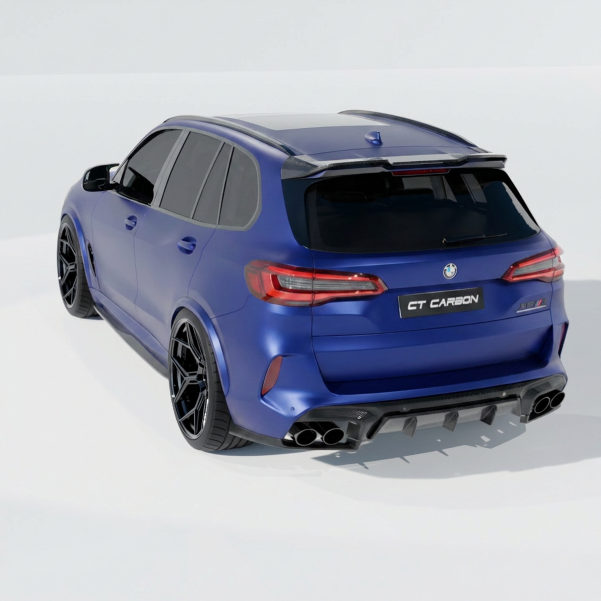 BMW F95 X5M 2019-2022 CT Design carbon fiber full kit installed on the vehicle, showcasing sleek, lightweight carbon fiber accents.