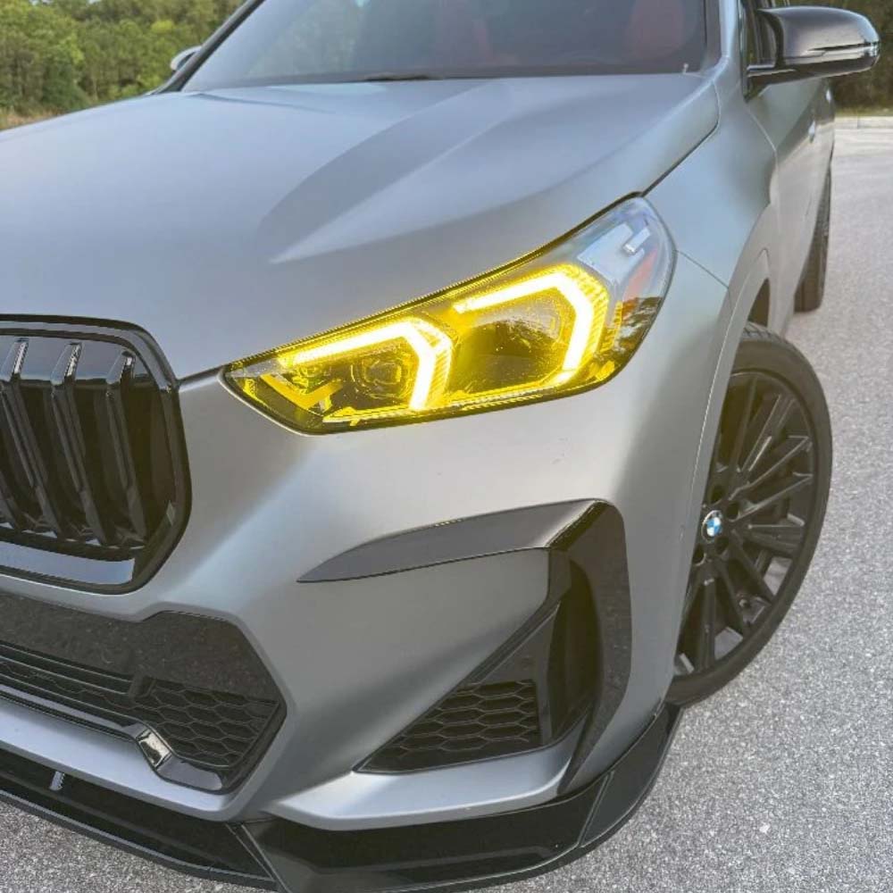 BMW X3 U11 U12 2023-2024 CT Carbon yellow adaptive DRL module set, close-up view of the LED daytime running lights.
