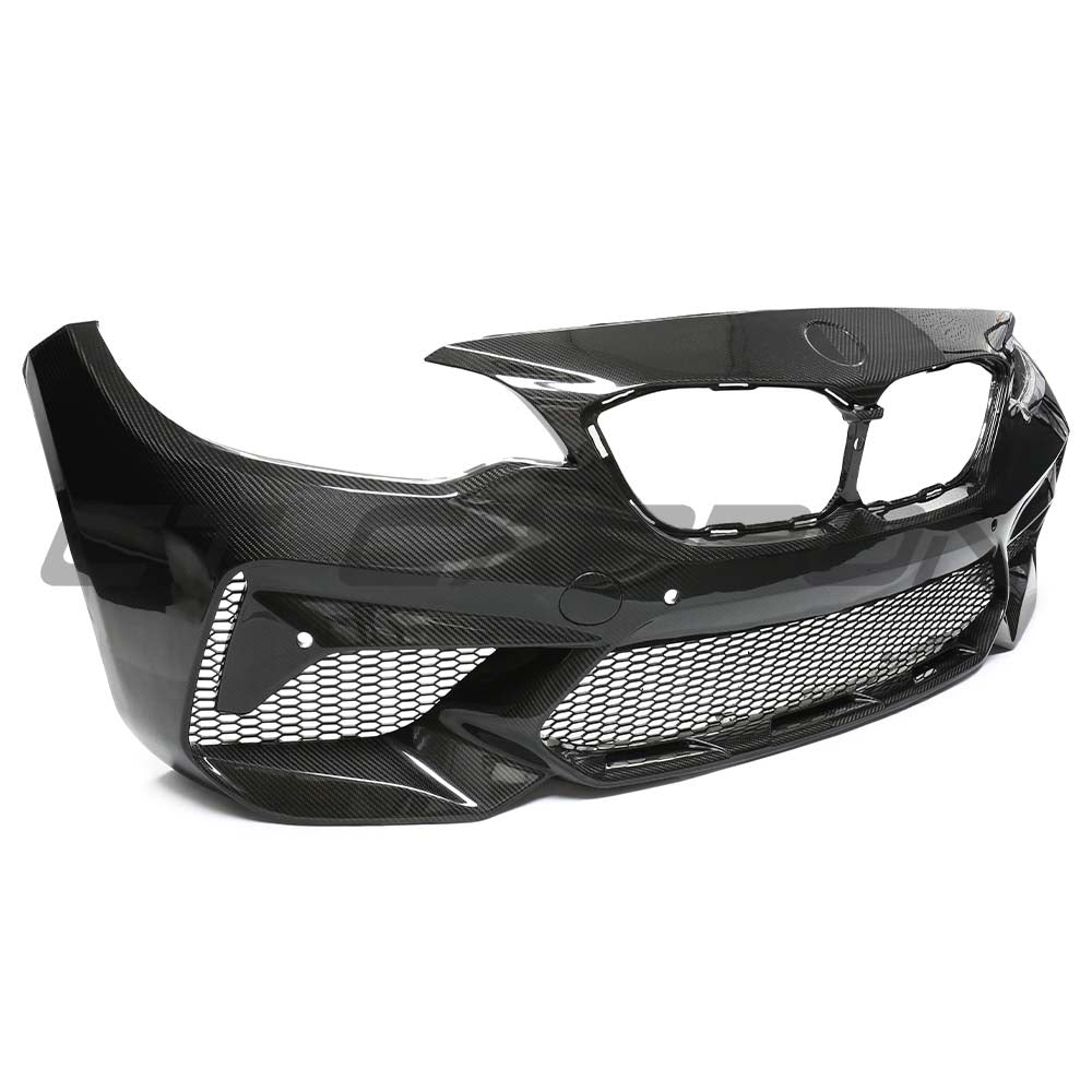 BMW F87 M2 carbon fibre bumper replacement kit by CT Carbon, showing sleek, lightweight carbon fibre bumper parts on a car.