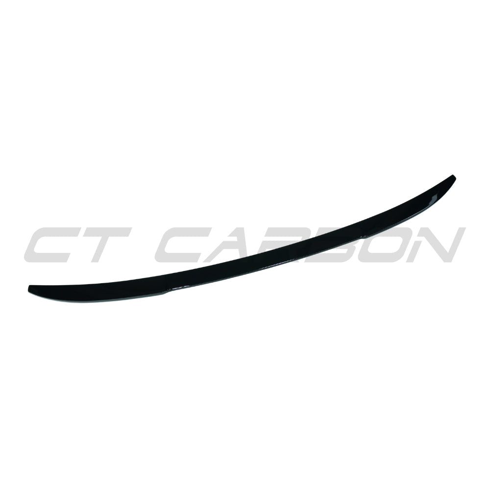 BMW X4 X4M G02 F98 2017-2024 CT Carbon gloss black spoiler mounted on the rear of the vehicle.