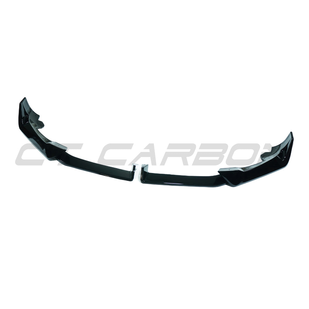 BMW X6 G06 2023+ LCI CT Carbon gloss black splitter front view, showing sleek aerodynamic design and high-quality carbon finish.