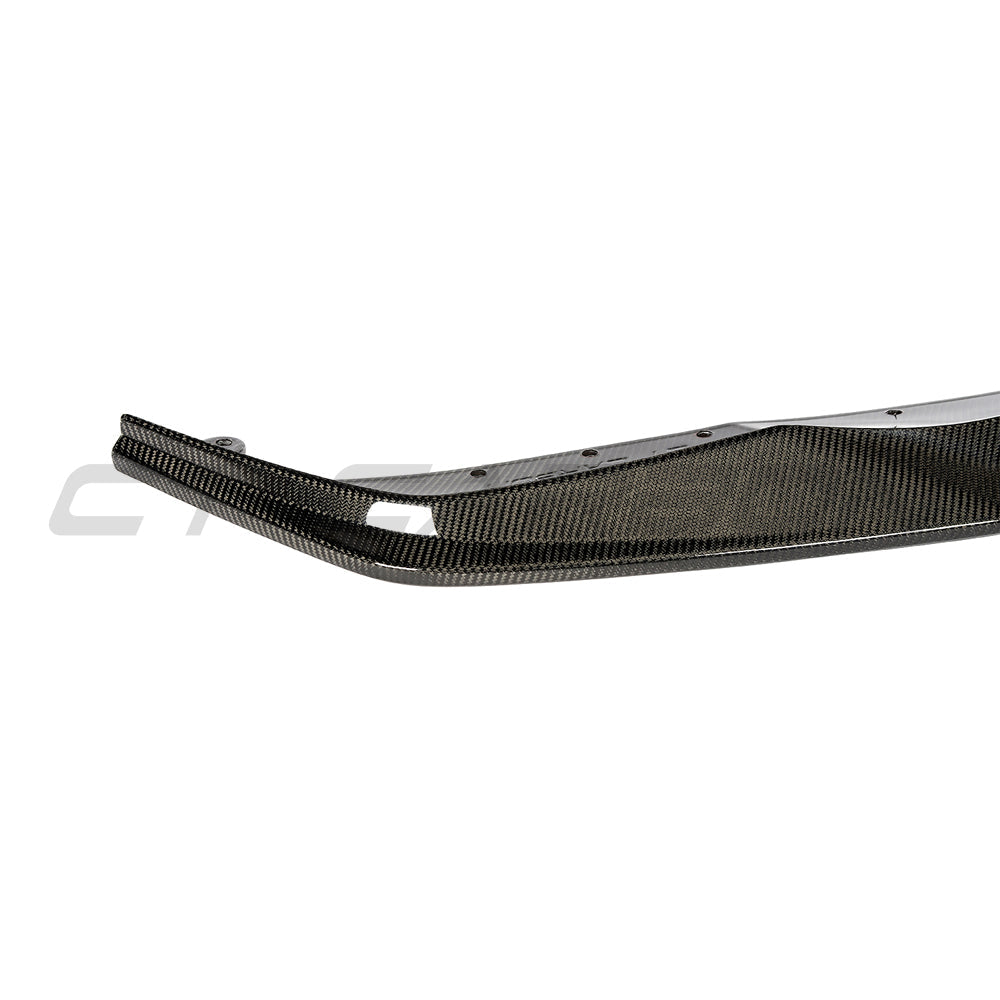 BMW G82 M4 full carbon fibre kit by CT Carbon, showing close-up of carbon fiber panels and aerodynamic design details.