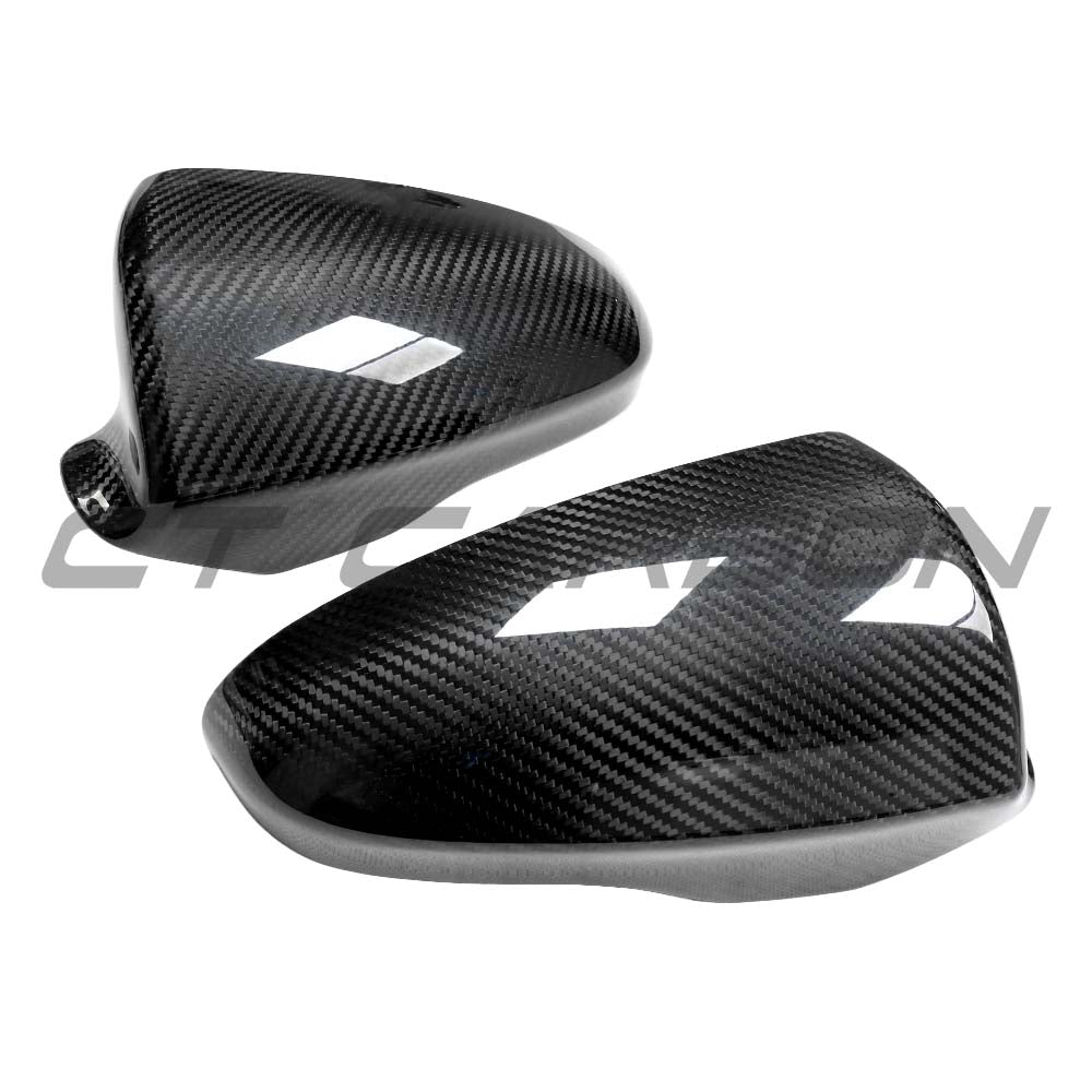 BMW F06/F12/F13/F10 M5 M6 series dry carbon fiber mirror cover replacement by CT Carbon, showing sleek, textured carbon fiber surface.