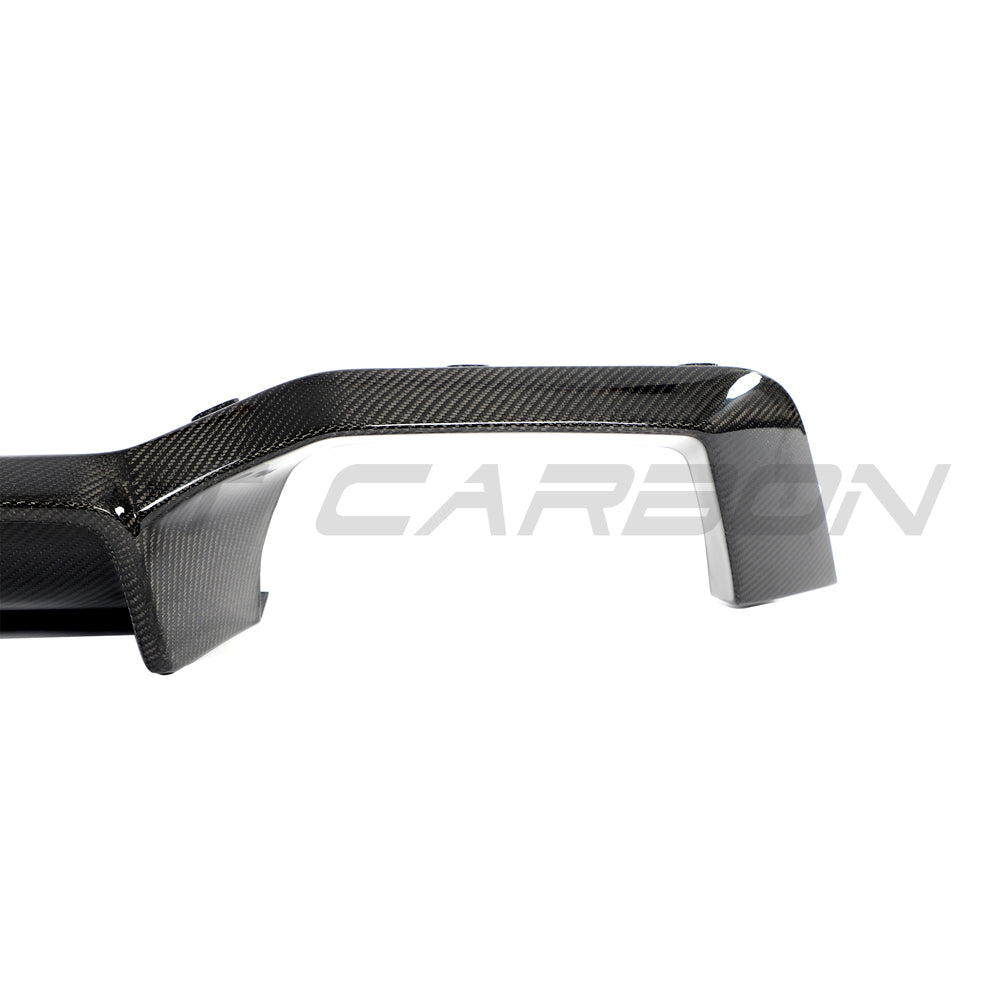BMW G02 X4 and F98 X4M LCI carbon fiber diffuser by CT Carbon, showcasing sleek black carbon fiber with aerodynamic design.