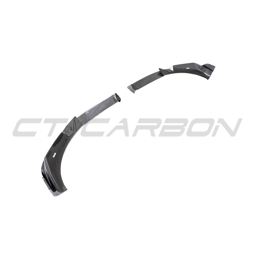 BMW G02 X4 and F98 X4M full carbon fibre kit by CT Carbon, showing detailed carbon fibre panels and trim on the vehicle.