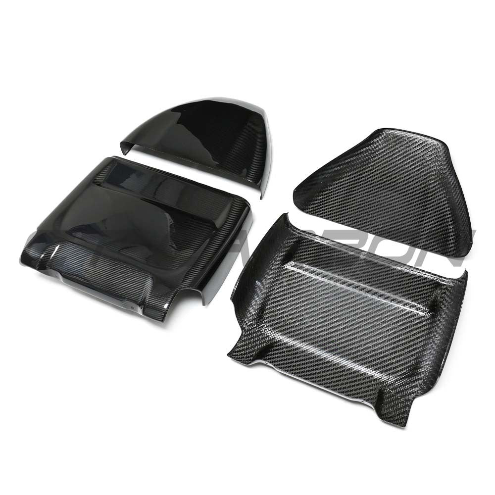 BMW M5 F90 dry carbon seat backs accessory by CT Carbon, showcasing sleek carbon fiber finish on the seat back surfaces.
