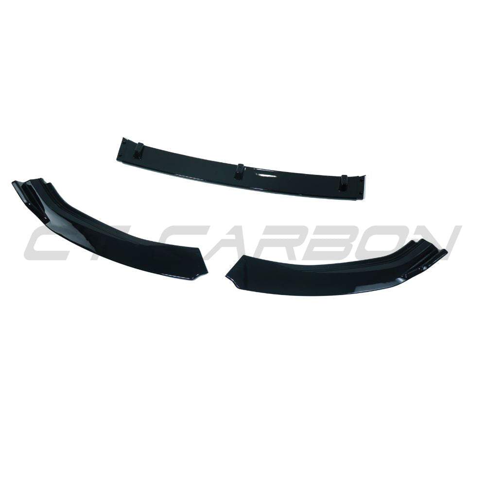 Gloss black splitter for Volkswagen Golf MK7/7.5 2012-2020 by CT Carbon, shown installed on the front of the car.