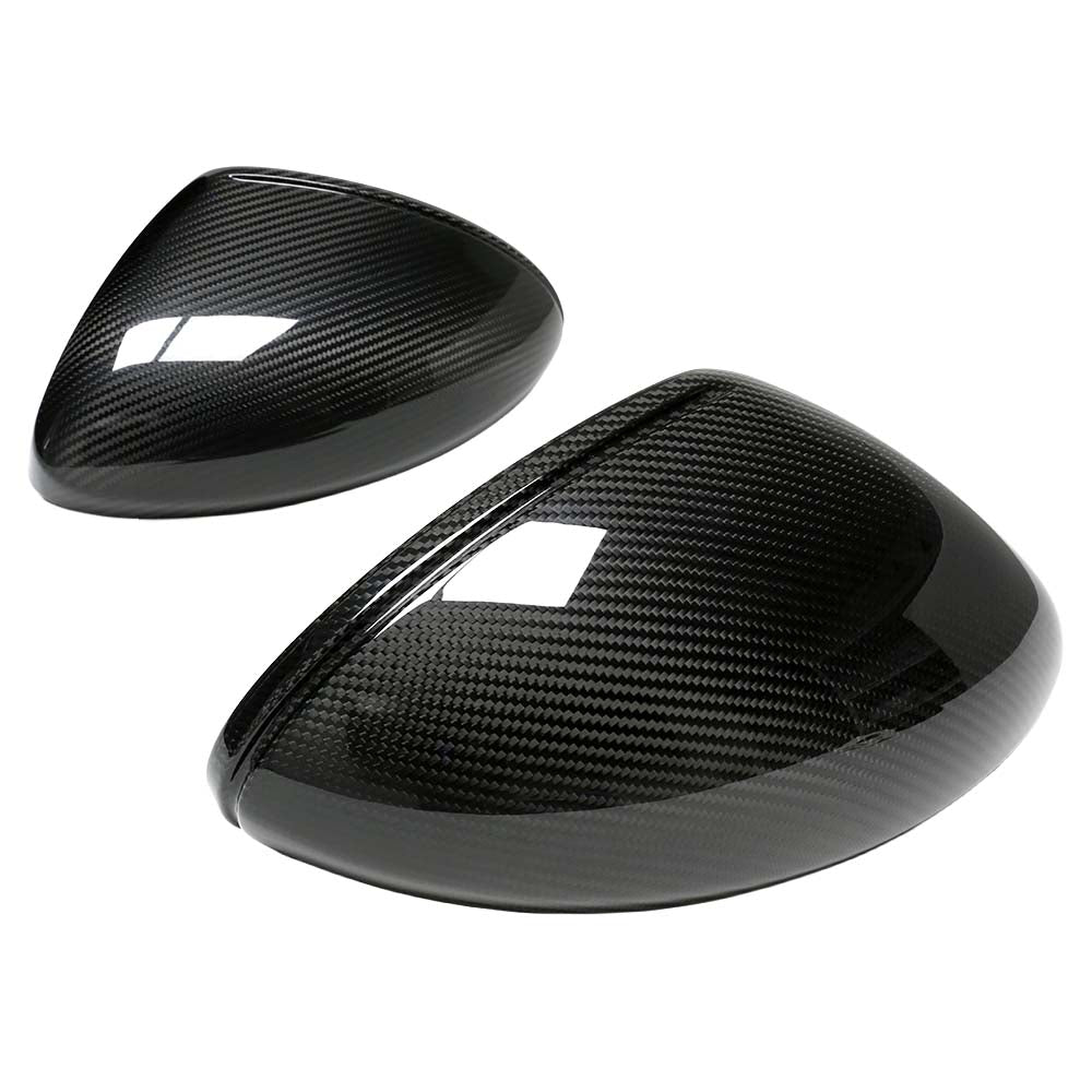 RHD dry carbon mirror covers for Porsche 718 Cayman and Boxster 2019-2021, made by CT Carbon, shown on car side mirrors.