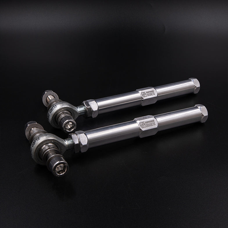 Suspension Secrets adjustable bump steer tie rod ends for Porsche 911 GT3 (992) suspension linkages, showing metal components and adjustment points.