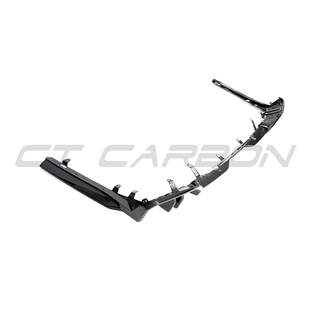 BMW 5 Series G60 and i5 2023+ carbon fibre diffuser by CT Carbon, showcasing sleek, aerodynamic design.