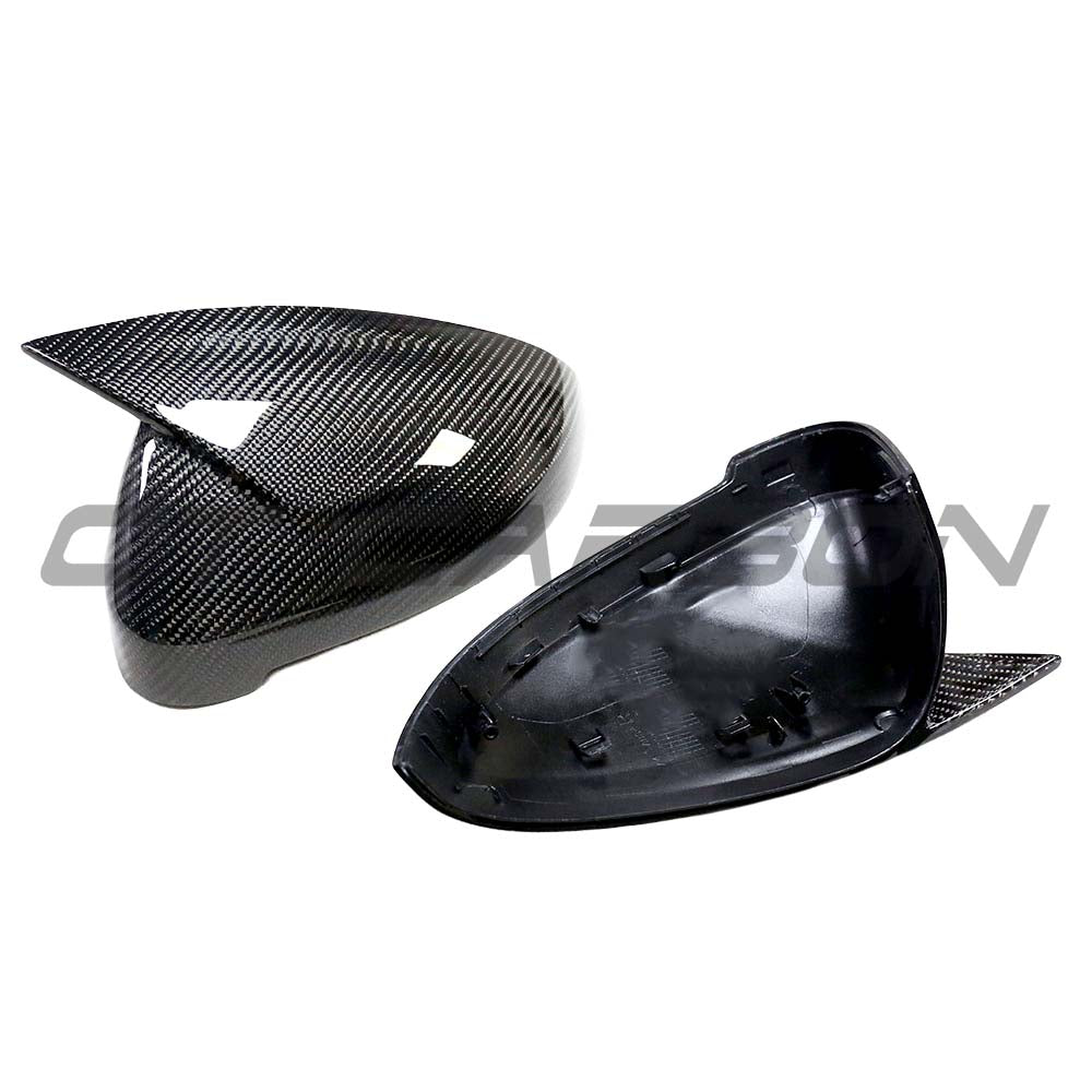 CT Carbon Audi A4 B9 2015-2023 carbon fiber mirror covers installed on side mirrors, showcasing sleek, textured finish.