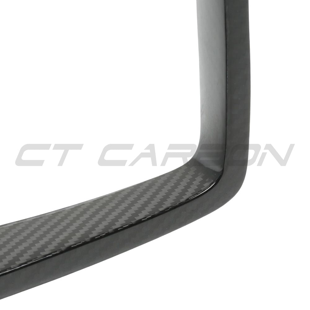 CT Carbon BMW X3M/X4M F97/F98 LCI 2022+ carbon fiber front bumper middle trim accessory showing textured black finish.