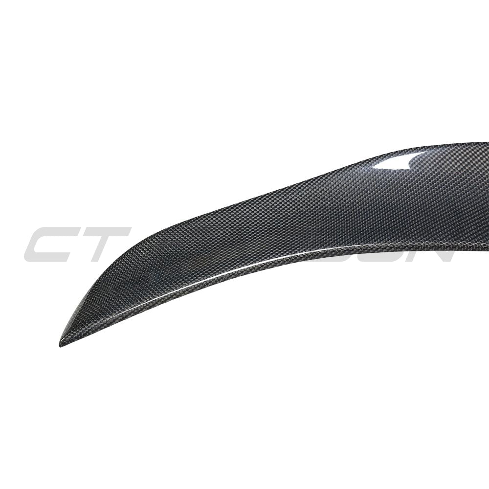 Tesla Model 3 2017-2023 CT Carbon V10 carbon fiber spoiler installed on the rear of the vehicle.