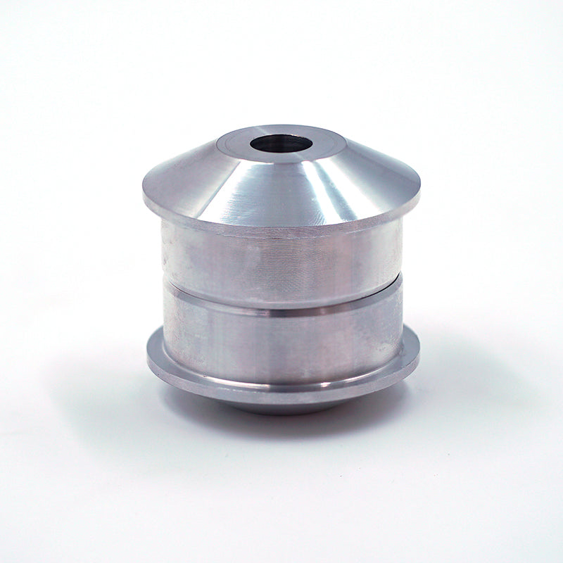 Suspension Secrets solid control arm bushes for Porsche 981 and 718 Cayman GT4, close-up of durable suspension linkage components.