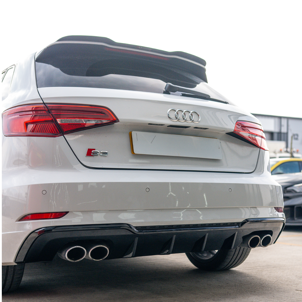 Gloss black diffuser for Audi A3/S3 8V Facelift Sportback 5-door, by CT Carbon, showcasing sleek aerodynamic design.