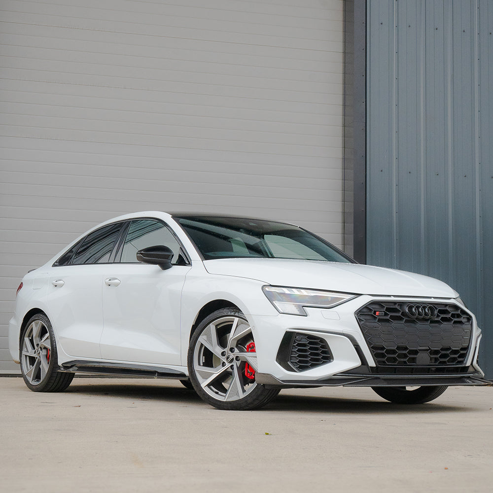 Full car view of an Audi A3/S3 8Y saloon with CT Carbon full carbon fibre kit installed, showcasing sleek, lightweight body enhancements.