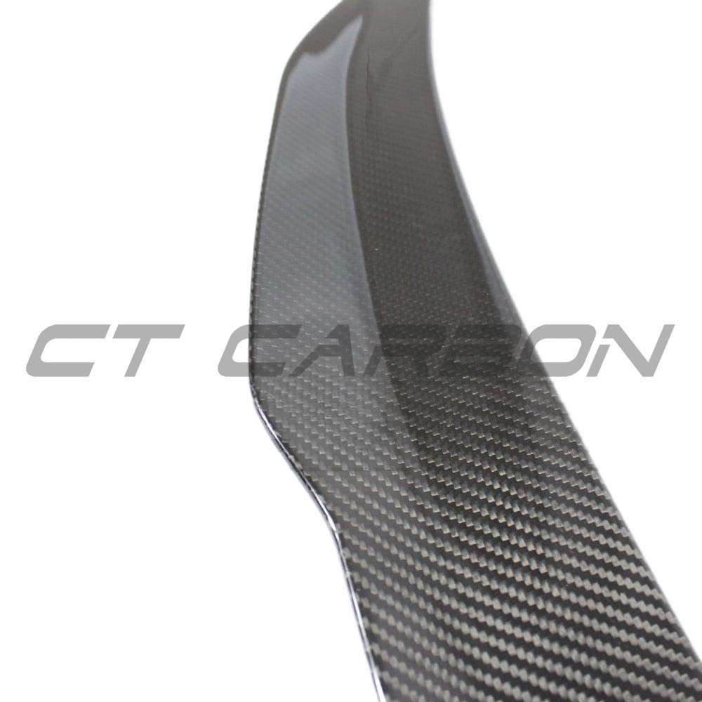 Audi A3/S3 8Y saloon full carbon fibre kit by CT Carbon, featuring a sleek carbon fibre spoiler on a modern car.