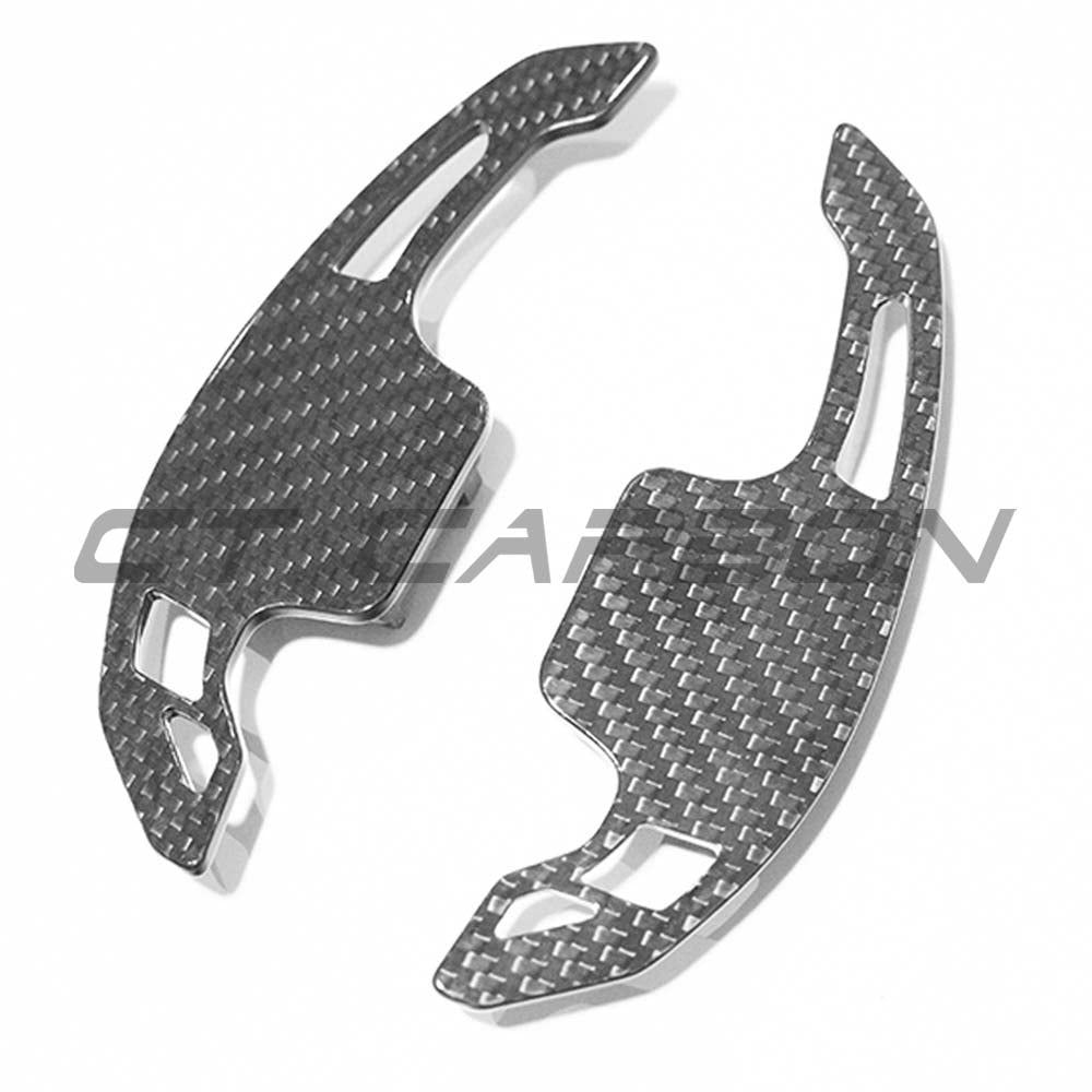 Audi A3/S3/RS3 8Y RS6 C8 carbon fiber shifter paddles by CT Carbon, close-up view showing sleek, textured finish.