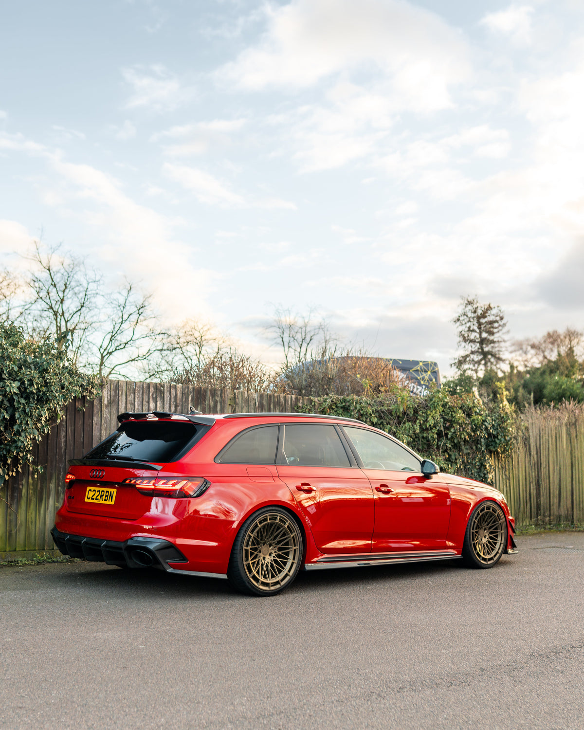 Carbon fiber diffuser for Audi RS4 B9/B9.5 from CT Design, showcasing sleek, textured carbon material on the vehicle's rear.