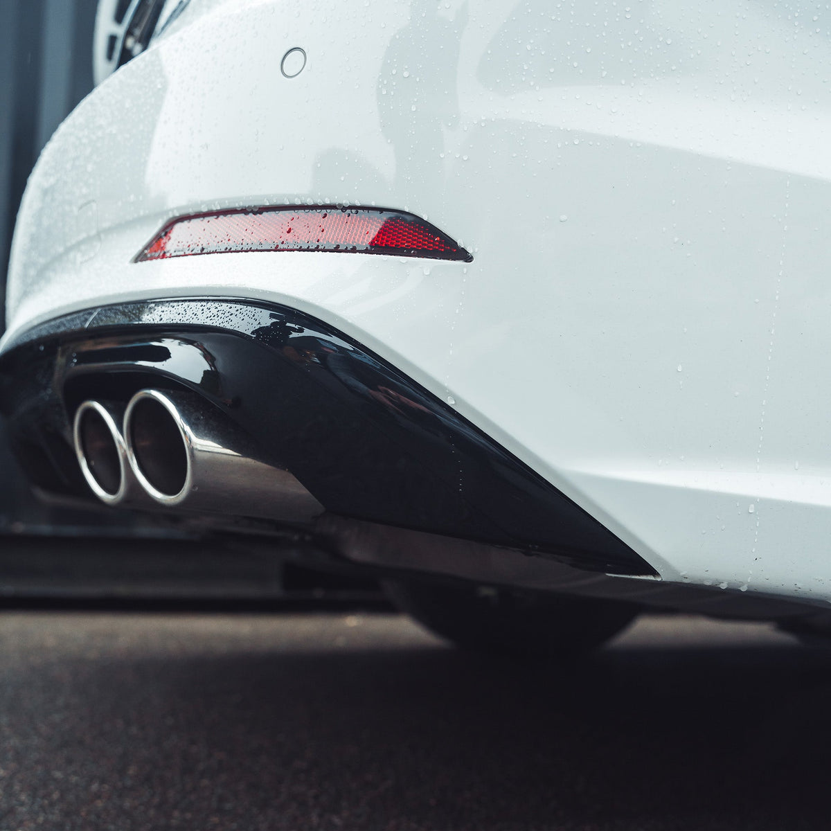 Gloss black diffuser for Audi A5/S5 B9 (2016-2019) by CT Carbon, showcasing the sleek, aerodynamic rear diffuser design.