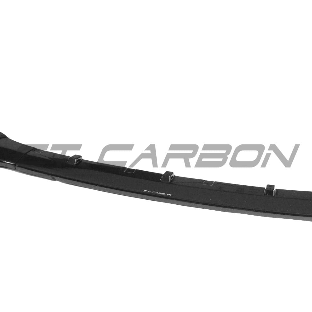 Gloss black splitte for AUDI A5/S5 B9 2016-2019 by CT Carbon, mounted on front bumper for sporty enhancement.