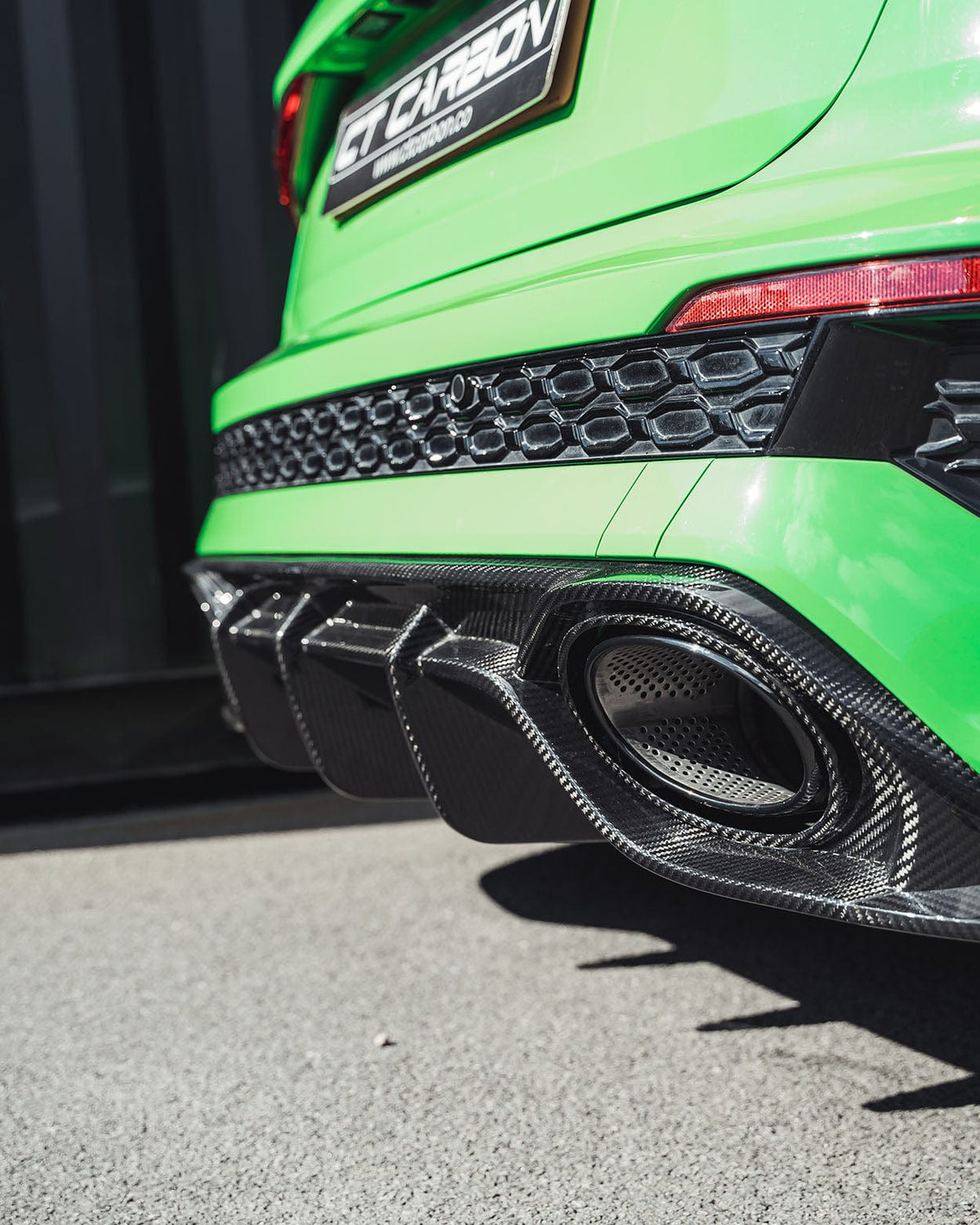 Audi RS3 8Y Sportback full carbon fibre kit by CT Design, showing front diffuser and side accents on a sporty hatchback.
