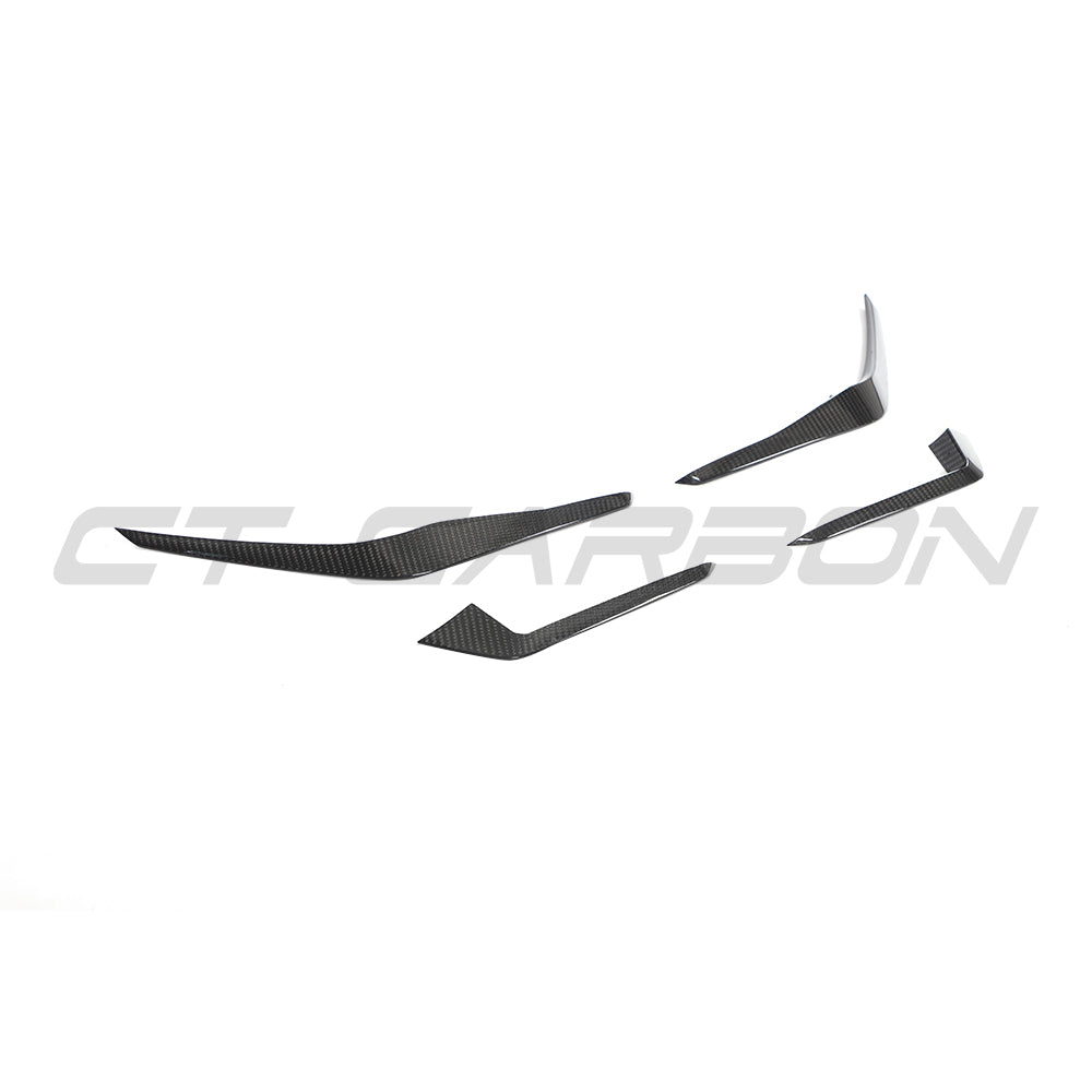 Audi RS4 B9.5 carbon fiber front canards from CT Design, lightweight aerodynamic accessories on the front of the car.