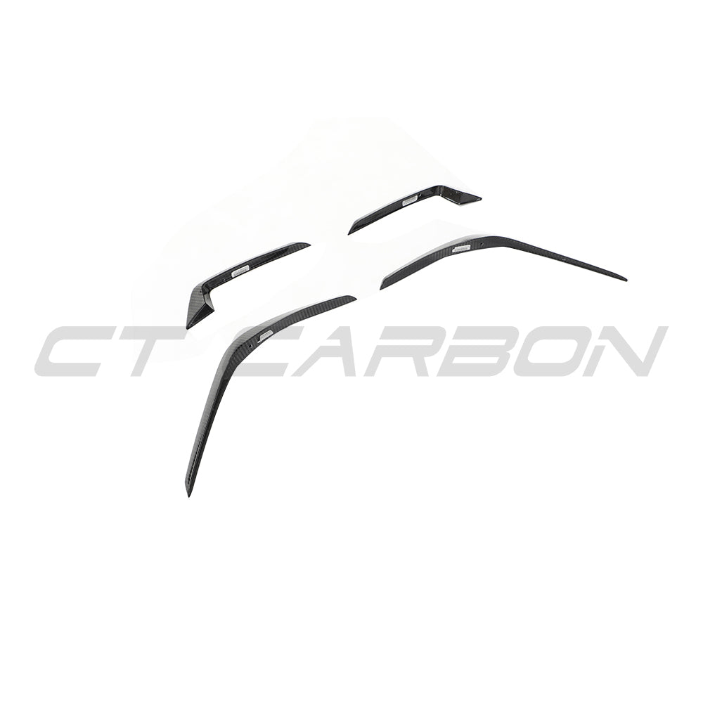 Audi RS4 B9.5 carbon fiber front canards by CT Design, lightweight aerodynamic accessories, shown on the front of the car.