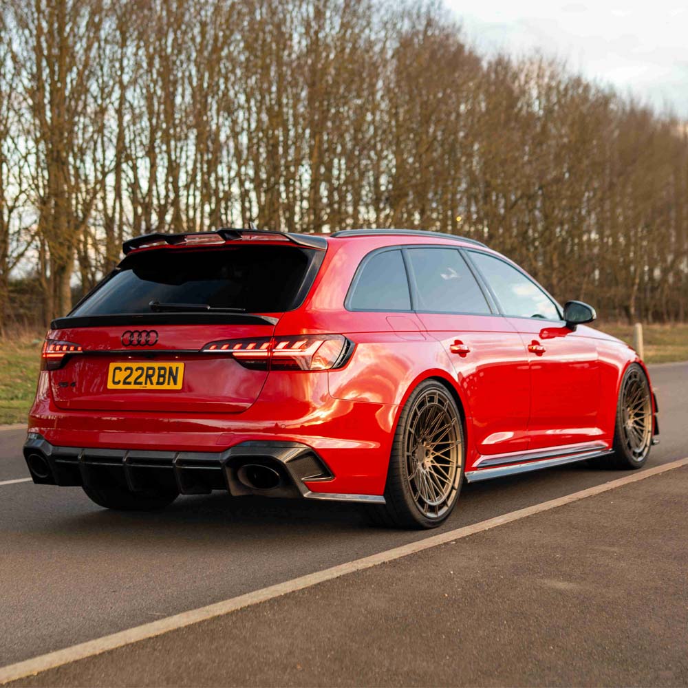 Carbon fibre middle spoiler for Audi A4/S4/RS4 B9 & 9.5 by CT Design, showing the sleek, textured finish on the car's rear.