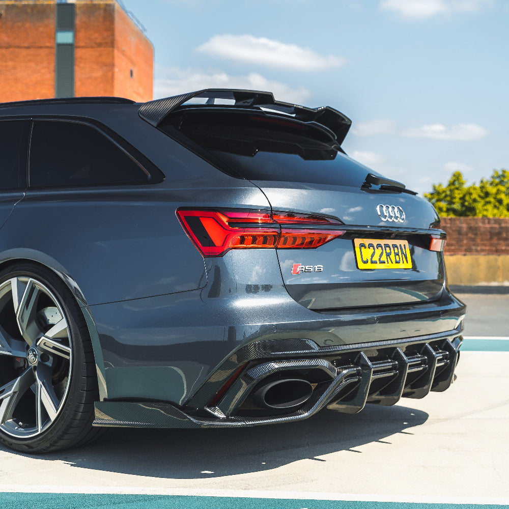 Audi RS6/RS7 C8 Carbon Fibre Diffuser by CT Carbon, showcasing sleek black carbon fibre rear diffuser with intricate design details.