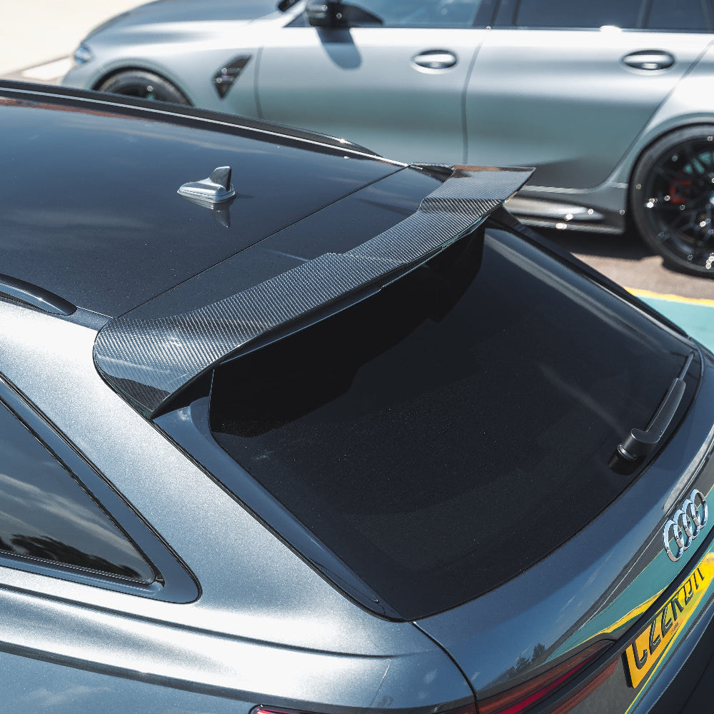 AUDI RS6 C8 Avant carbon fibre spoiler by CT Design, showcasing the sleek, aerodynamic design on the vehicle's rear.
