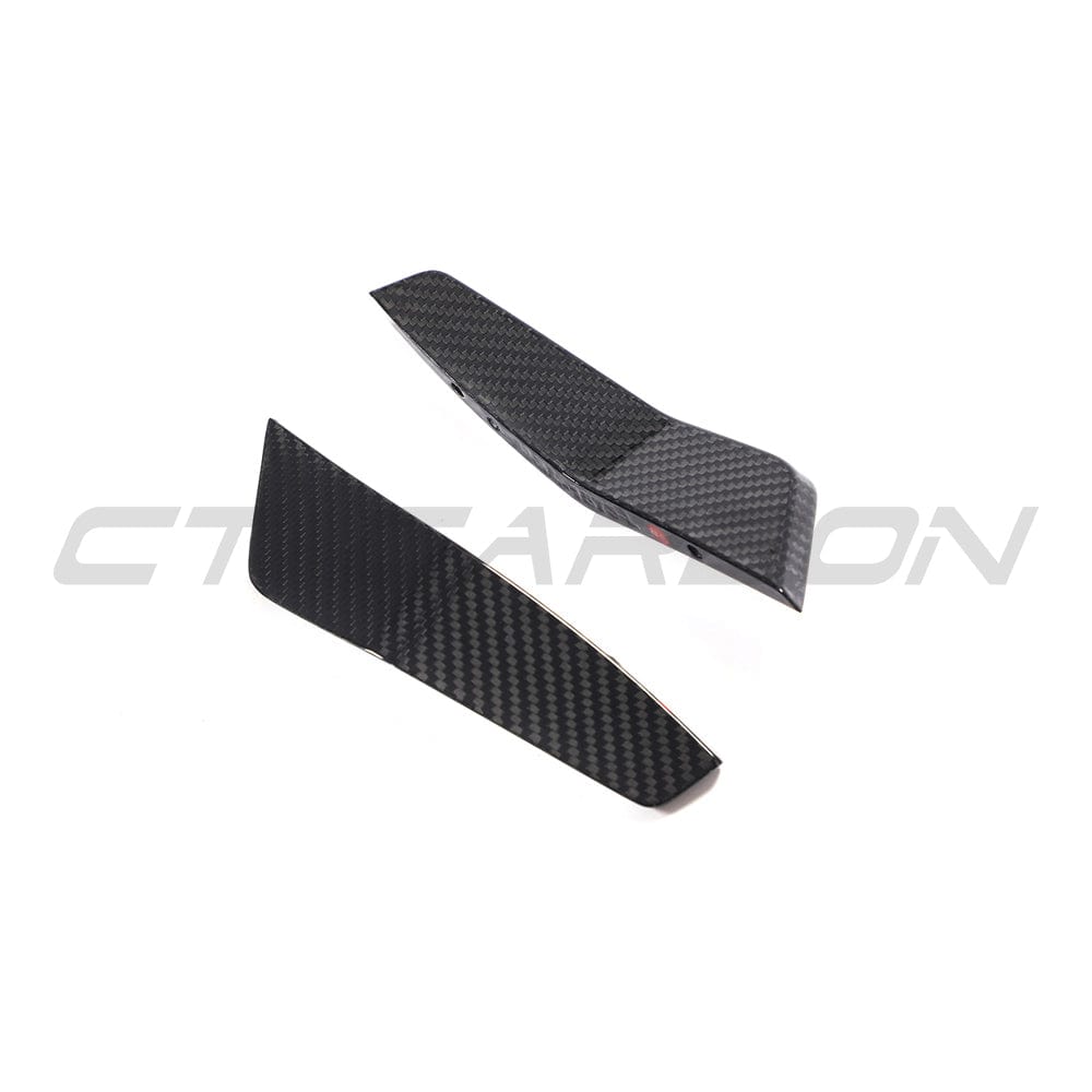 Full view of the CT Carbon Audi RS6 C8 2019+ full carbon fibre kit, showcasing canards and aerodynamic enhancements on the car.