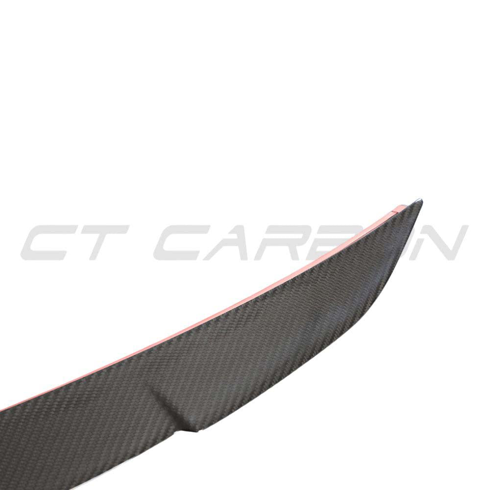 Carbon fibre spoiler for Audi RS7 C8 2019+ by CT Design, showing the sleek, aerodynamic rear spoiler on a luxury sports car.