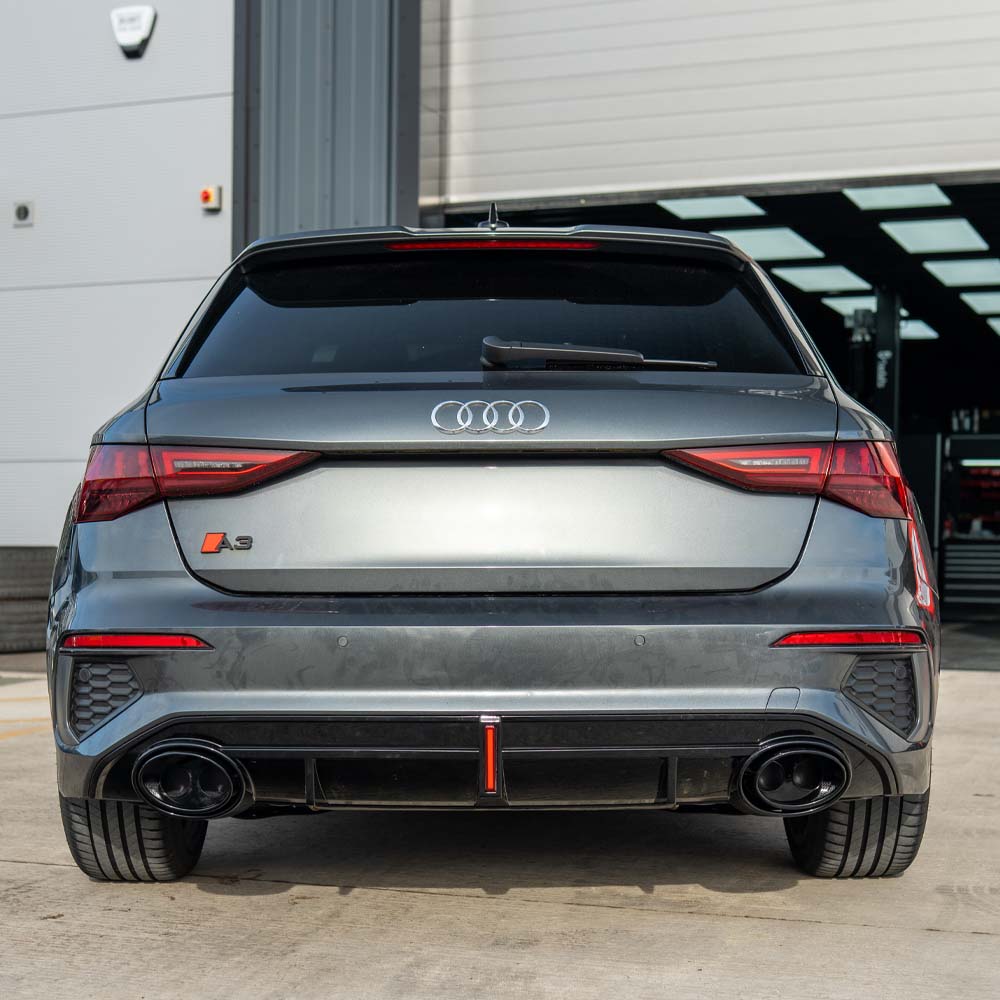 CT Carbon Audi S3/A3 8Y S-Line gloss black diffuser with tips and LED light, showcasing a sleek automotive upgrade design.