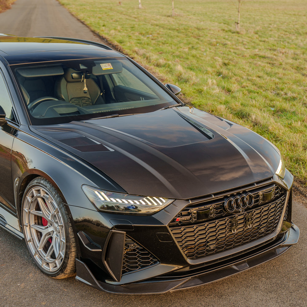 Audi A6/A7/S6/S7/RS6/RS7 C8 carbon fiber hood by CT Carbon, showing sleek, lightweight bonnet with carbon fiber weave.