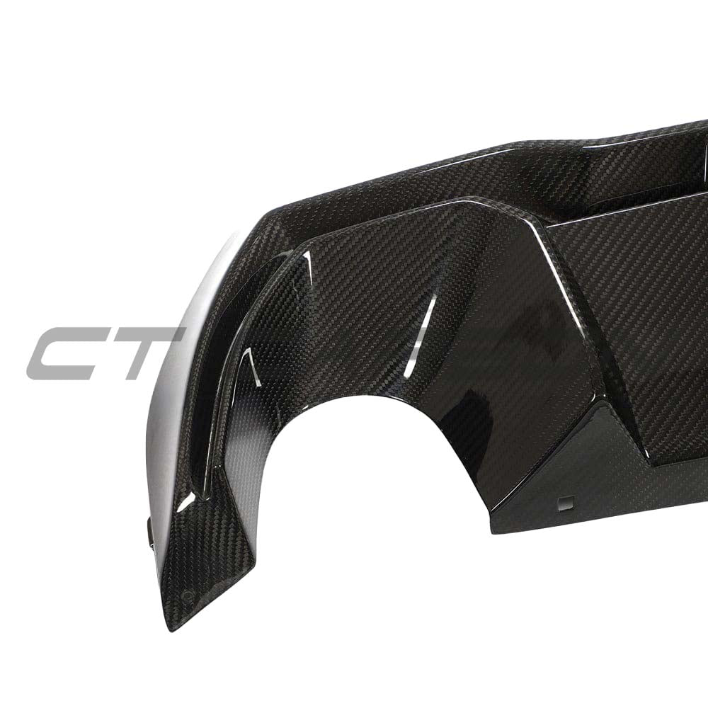 BMW 1 Series F40 full carbon fibre kit by CT Design, featuring a sleek carbon fibre diffuser with detailed weave pattern.