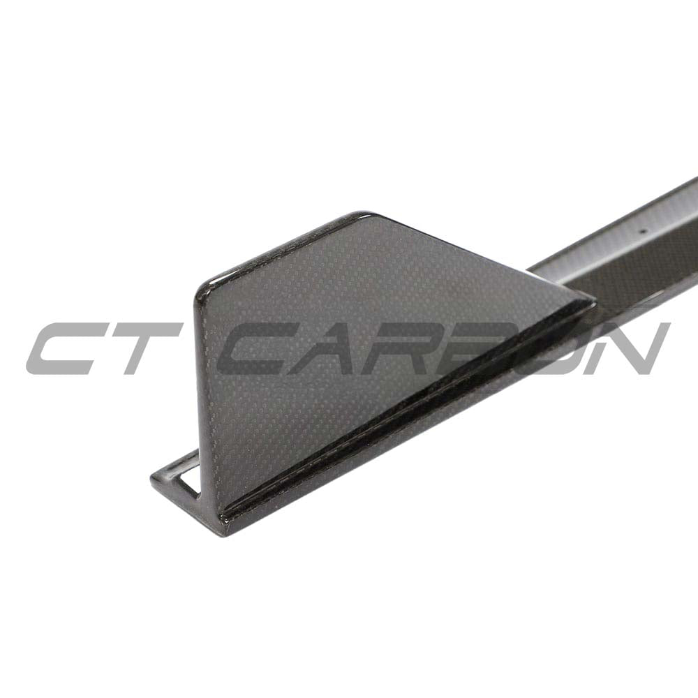 BMW 1 Series F40 2019-2024 carbon fibre side skirts kit by CT Design, featuring sleek carbon fiber finish and aerodynamic design.