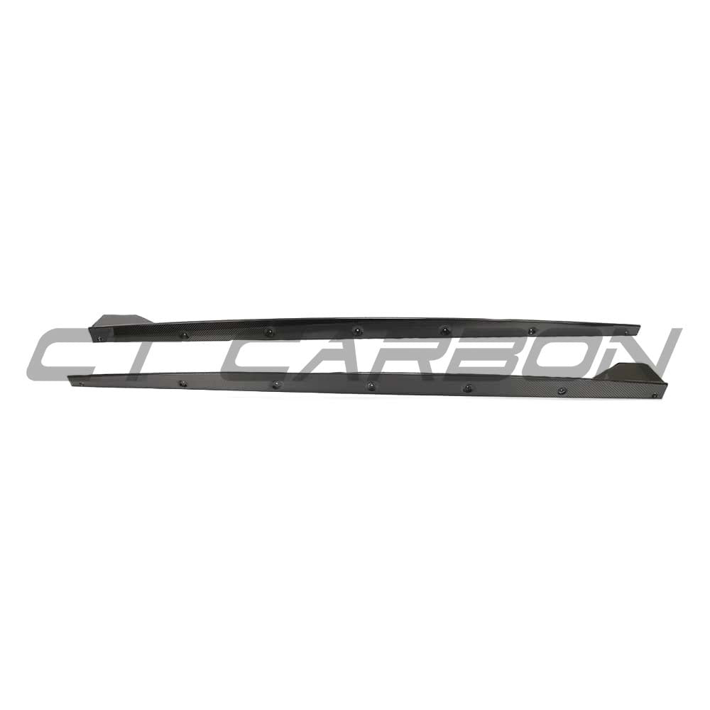 BMW 1 Series F40 carbon fibre side skirts by CT Design, showing sleek, textured carbon fiber surface and fitted side profile.